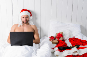 Santa Claus in hotel room without costume shopping for Christmas or New Year. 10 Christmas design ideas